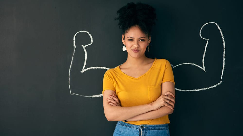 strength and resilience woman with chalk board